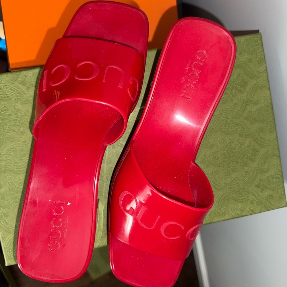 Red Gucci rubber sandals